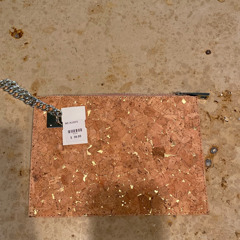 Sondra Robert’s Squared clutch purse with gold chain